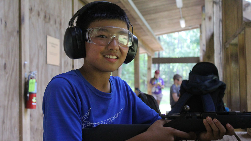 Kid at shooting range
